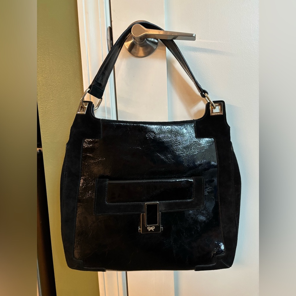Anya Hindmarch Black Leather and Suede 
Tote with gold clasps. NEVER USED.